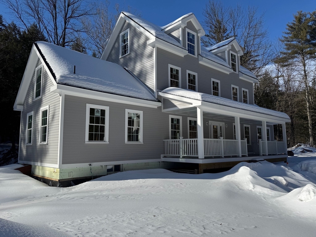 60 Keets Brook Road Bernardston, MA 01337 - Photo 3 of 29 a front view of a house with a yard