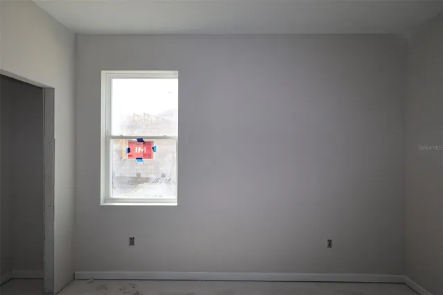 a picture of a bench in a white building