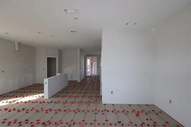 a bathroom with a bathtub sink and mirror