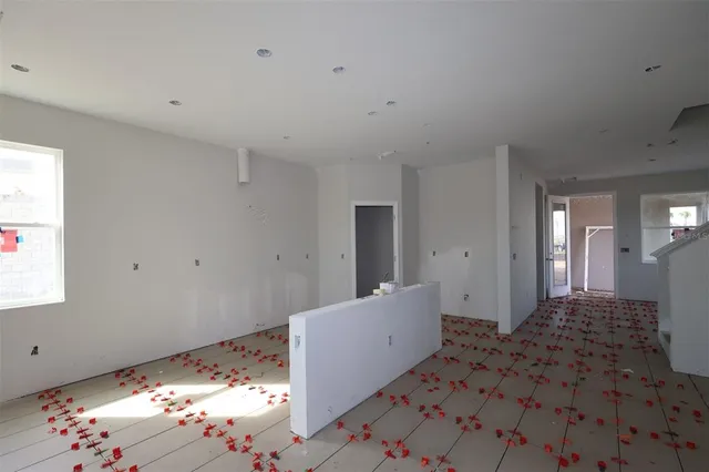 a view of an empty room and window