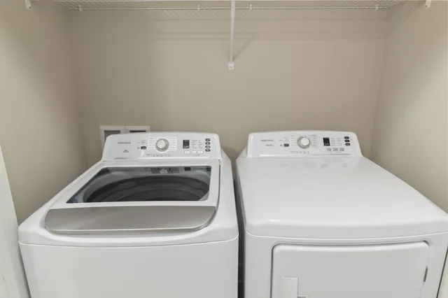 a bathroom with a sink double vanity and a mirror
