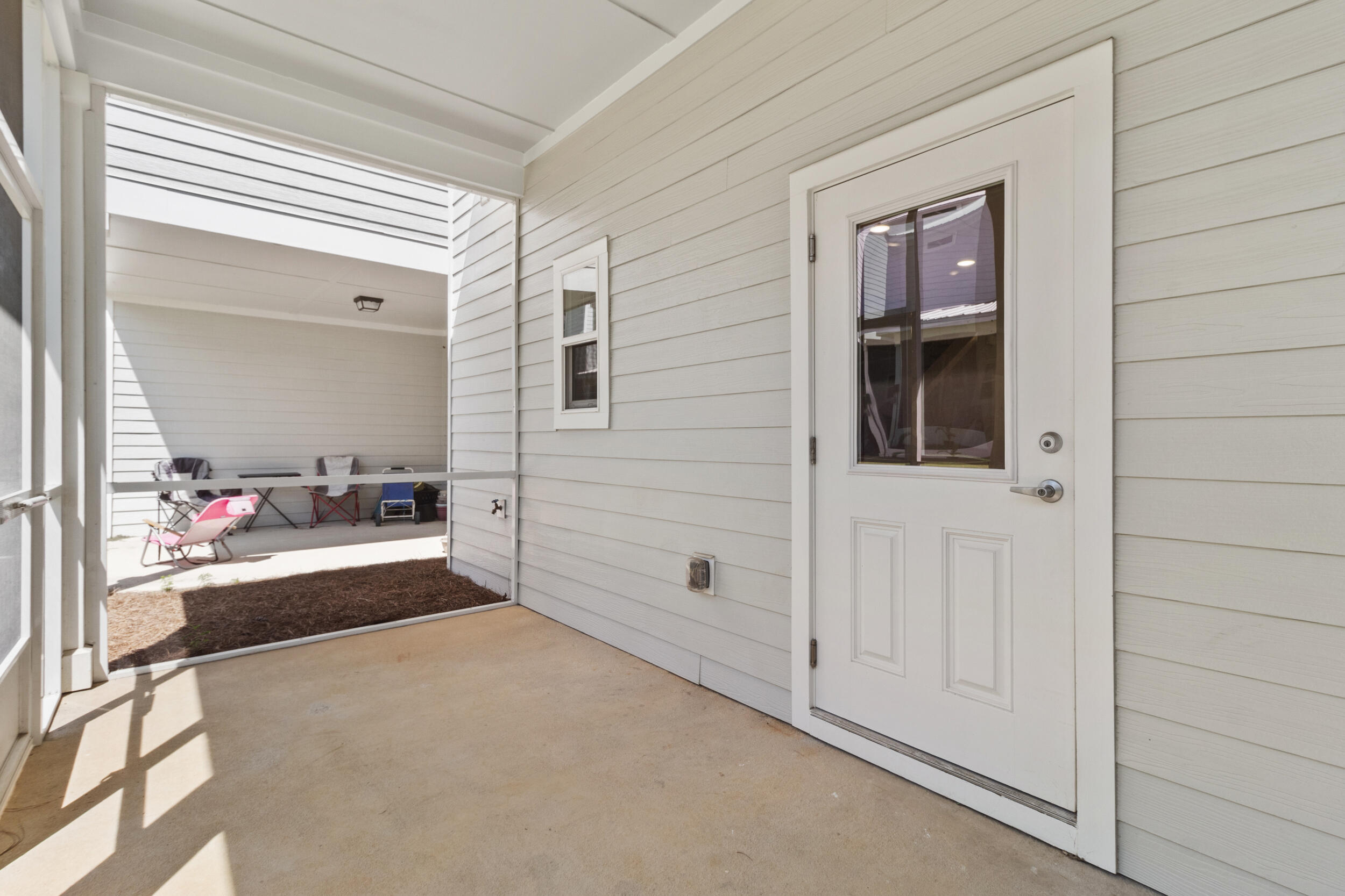 280 Date Palm Lane Freeport, FL 32439 - Photo 21 of 37 Back Porch with Screened Enclosure