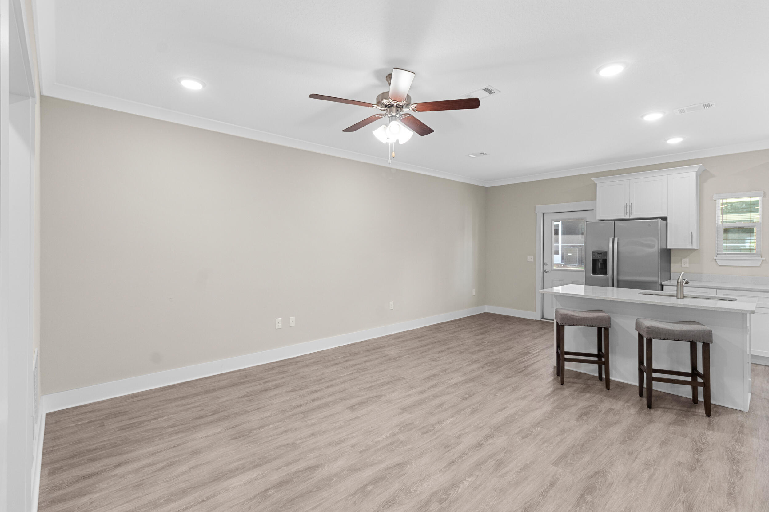 280 Date Palm Lane Freeport, FL 32439 - Photo 5 of 39 a view of workspace with wooden floor and window