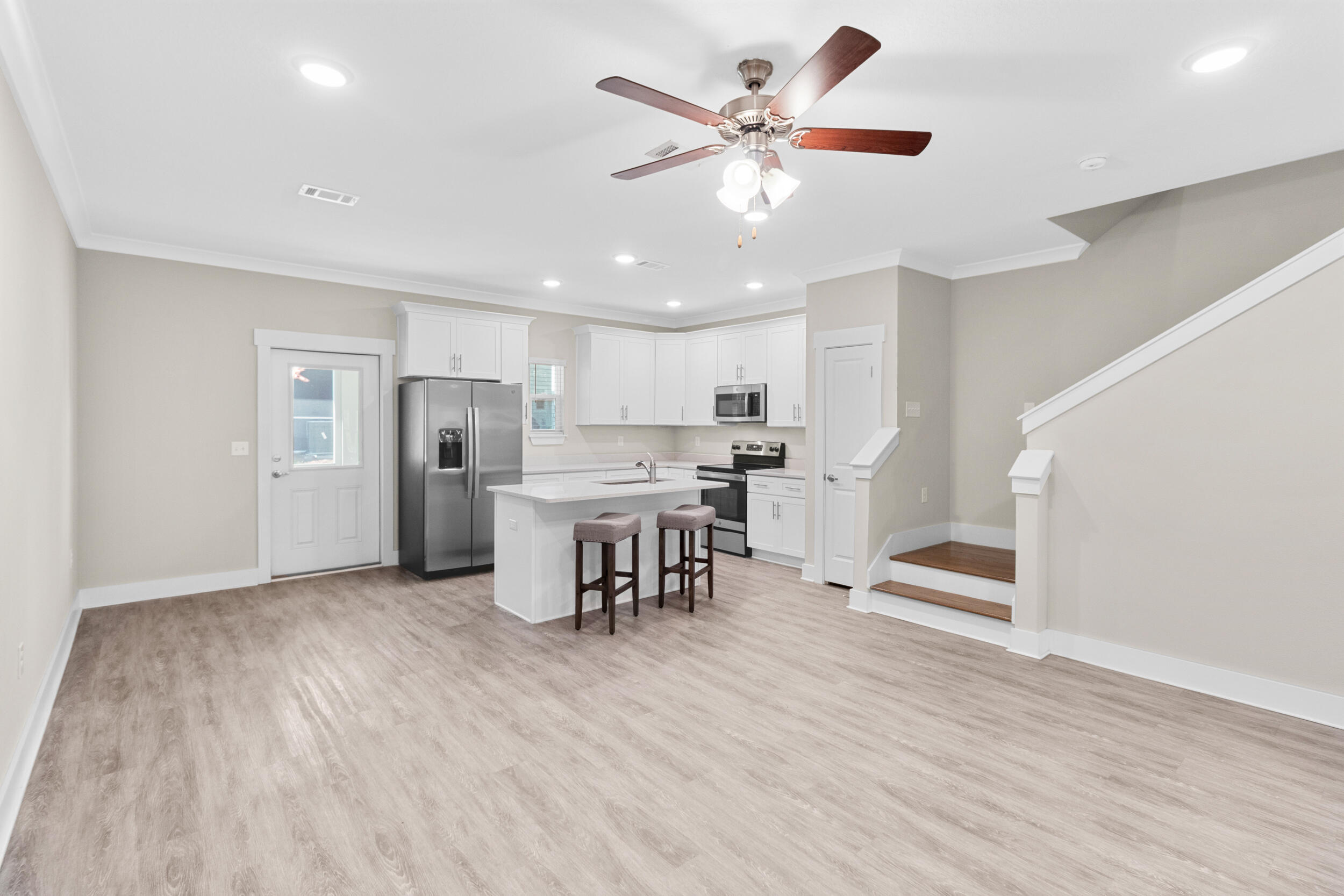 280 Date Palm Lane Freeport, FL 32439 - Photo 6 of 39 Living Area and Kitchen