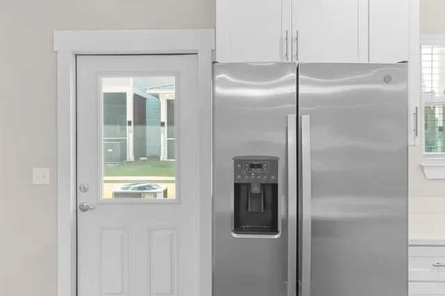 a workspace with furniture and a potted plant