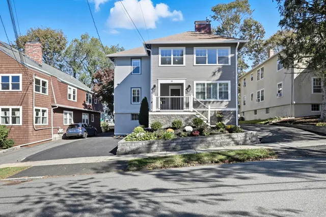 a front view of a house with swimming pool