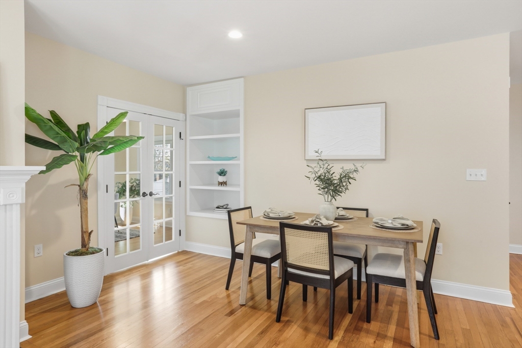16 Park Avenue, Unit 2 Winchester, MA 01890 - Photo 12 of 32 a view of a dining room with furniture and wooden floor
