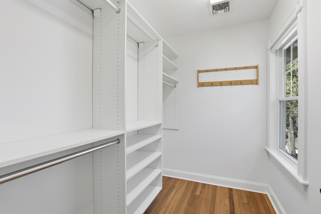 16 Park Avenue, Unit 2 Winchester, MA 01890 - Photo 18 of 32 a view of walk in closet with empty racks