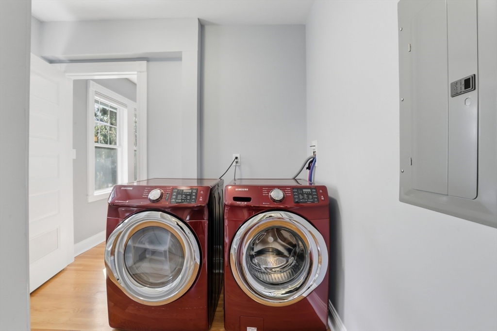 16 Park Avenue, Unit 2 Winchester, MA 01890 - Photo 28 of 32 a utility room with dryer and washer