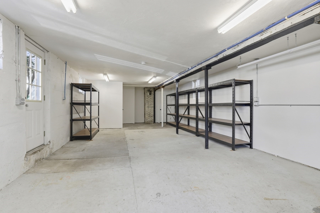 16 Park Avenue, Unit 2 Winchester, MA 01890 - Photo 30 of 32 a view of an empty room with window