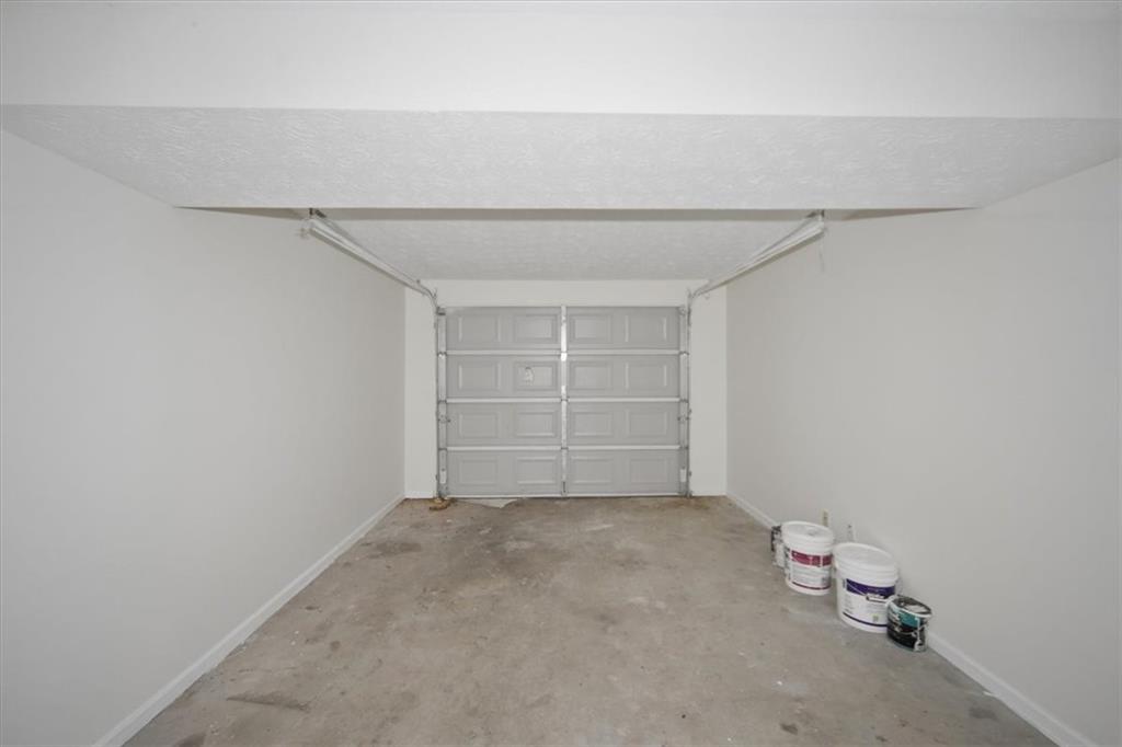 1496 Cherry Hill Road Southwest Conyers, GA 30094 - Photo 12 of 32 a view of an empty room with a window
