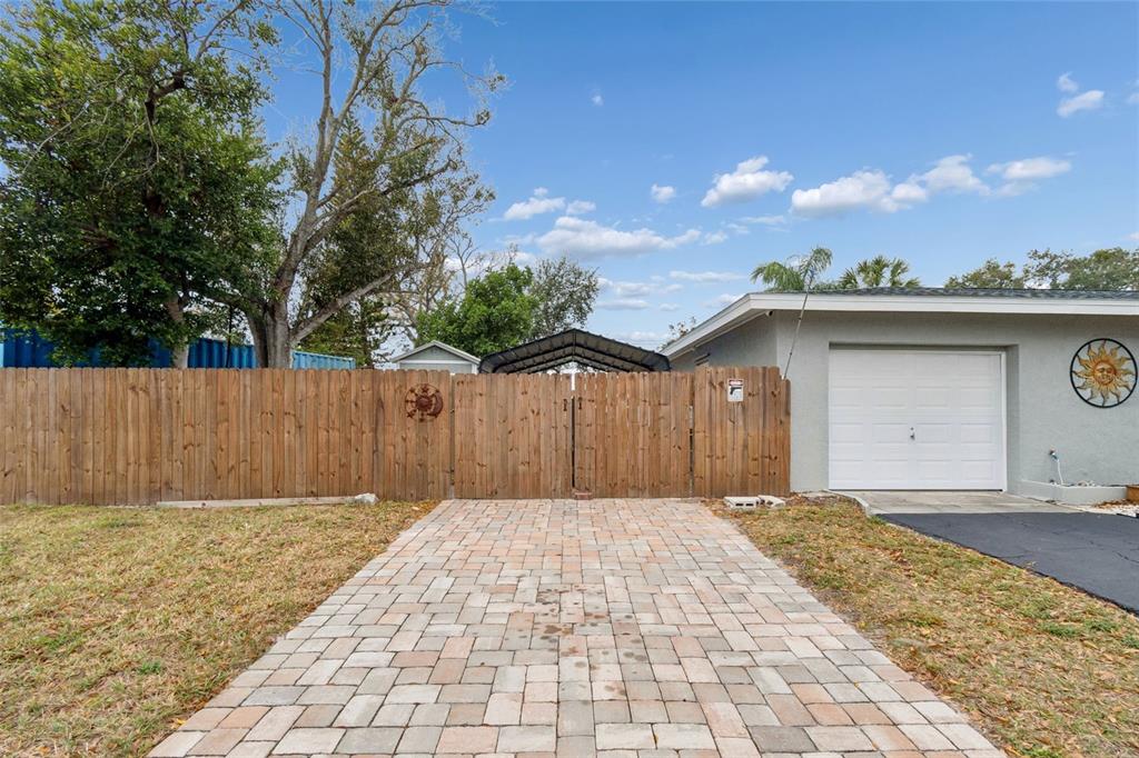 12424 105th Street Largo, FL 33773 - Photo 24 of 45 a front view of a house with a yard