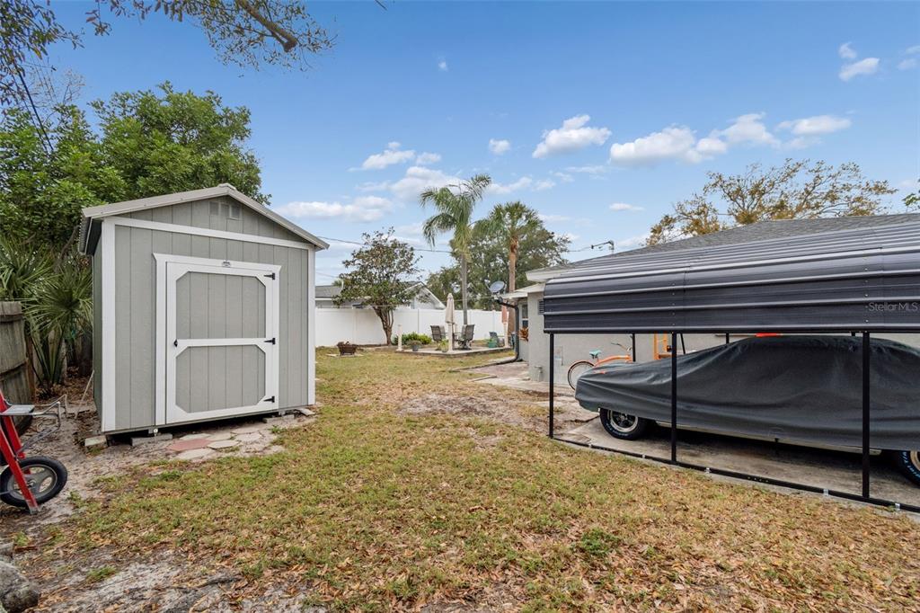 12424 105th Street Largo, FL 33773 - Photo 26 of 45 a house with trees in the background