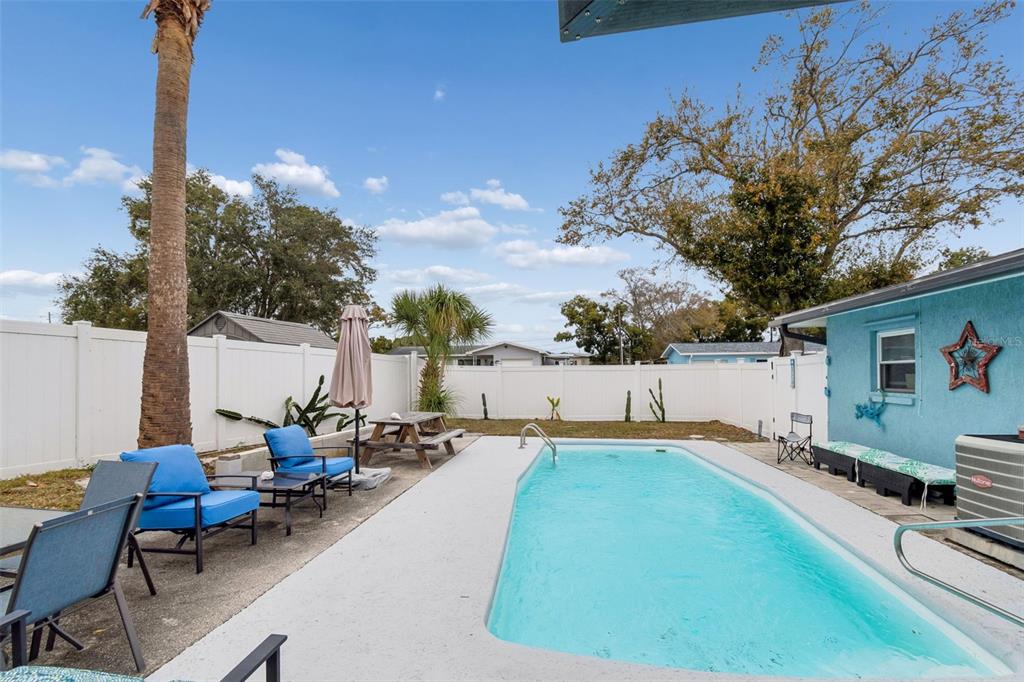 12424 105th Street Largo, FL 33773 - Photo 33 of 45 a view of a house with backyard and sitting area