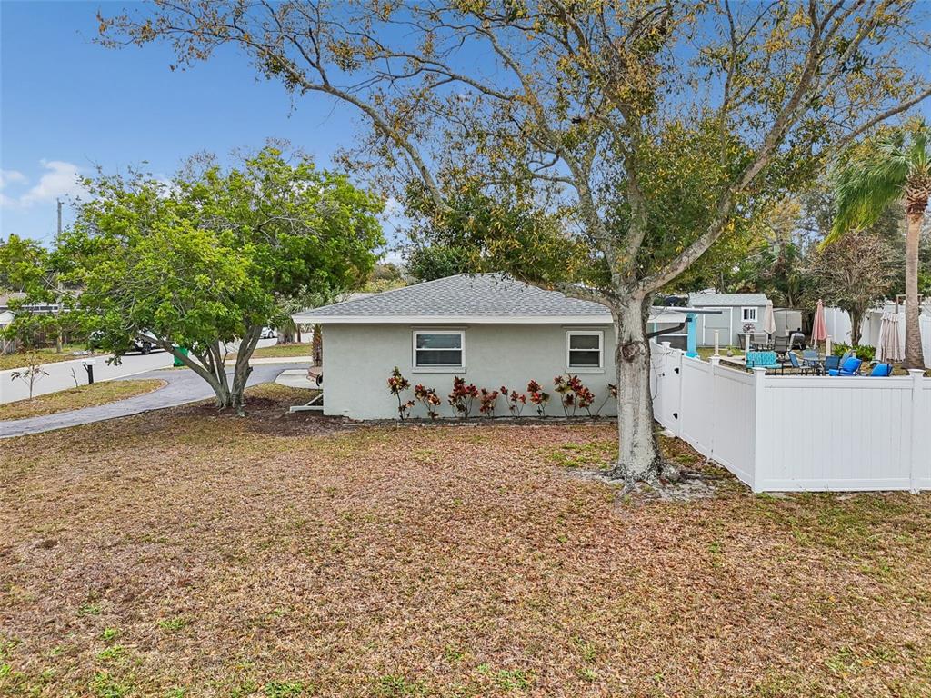 12424 105th Street Largo, FL 33773 - Photo 40 of 45 a view of a house with a yard