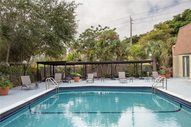 a view of a house with swimming pool