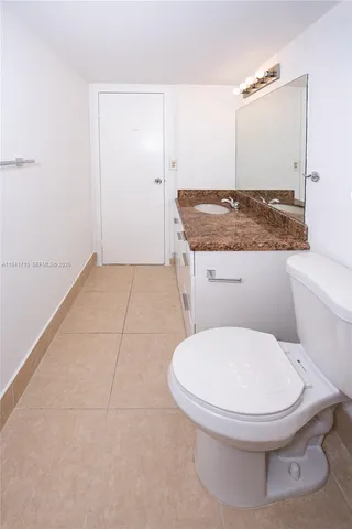 a bathroom with a toilet and a sink
