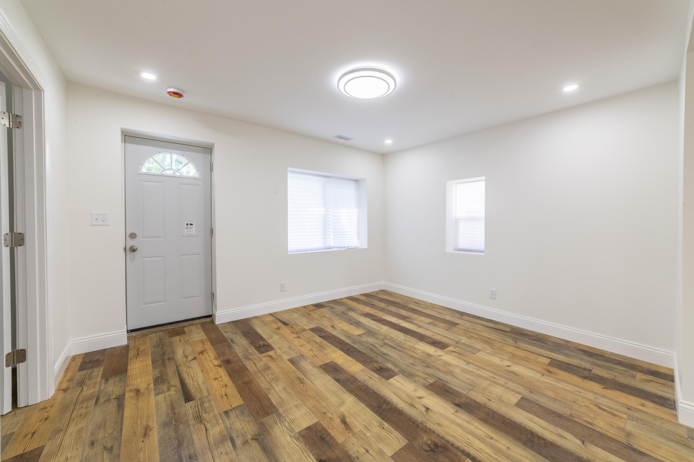 4645 Hayes Street Gary, IN 46408 - Photo 5 of 33 a view of empty room with wooden floor