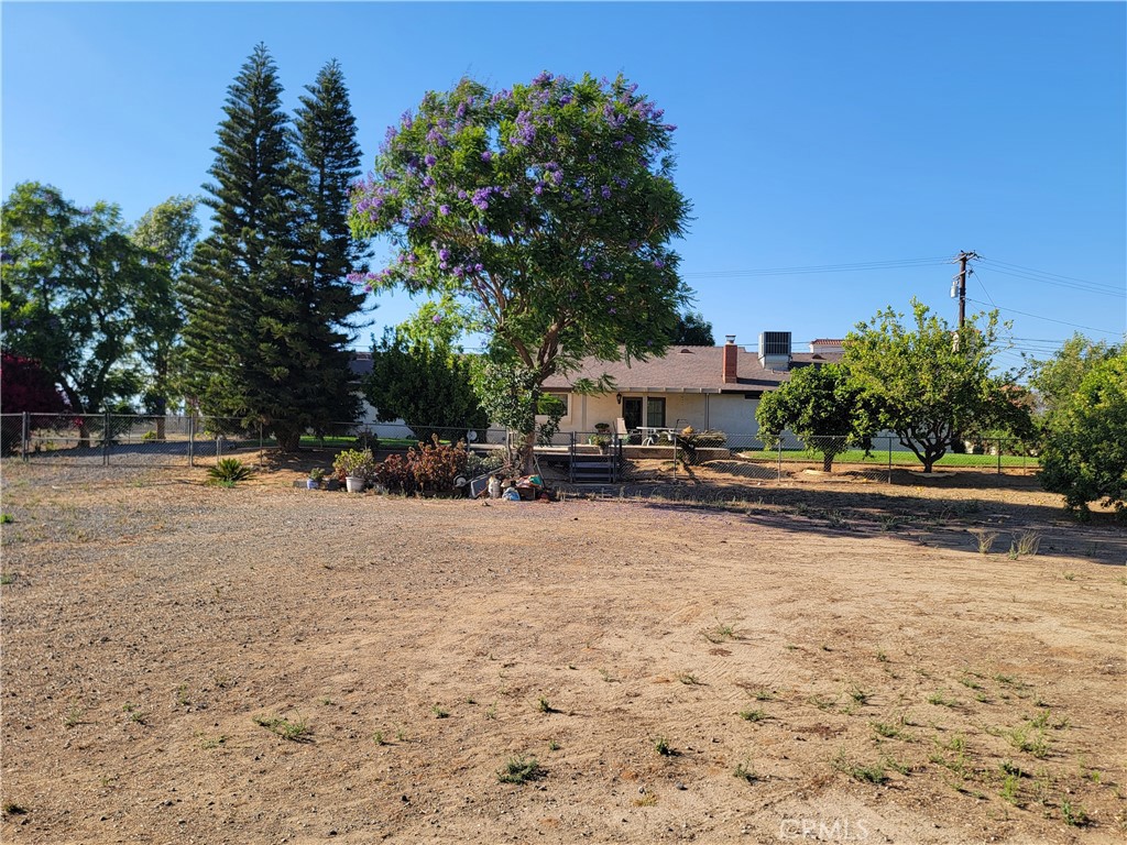 10170 60th Street Riverside, CA 92509 - Photo 12 of 24 a house with a tree in the background