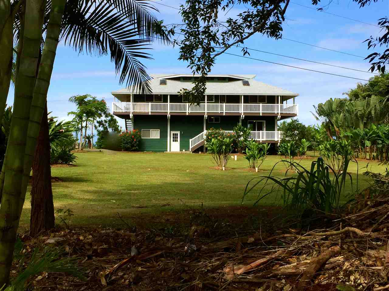 890 East Kuiaha Road Haiku, HI 96708 - Photo 5 of 30 a view of a house with a yard