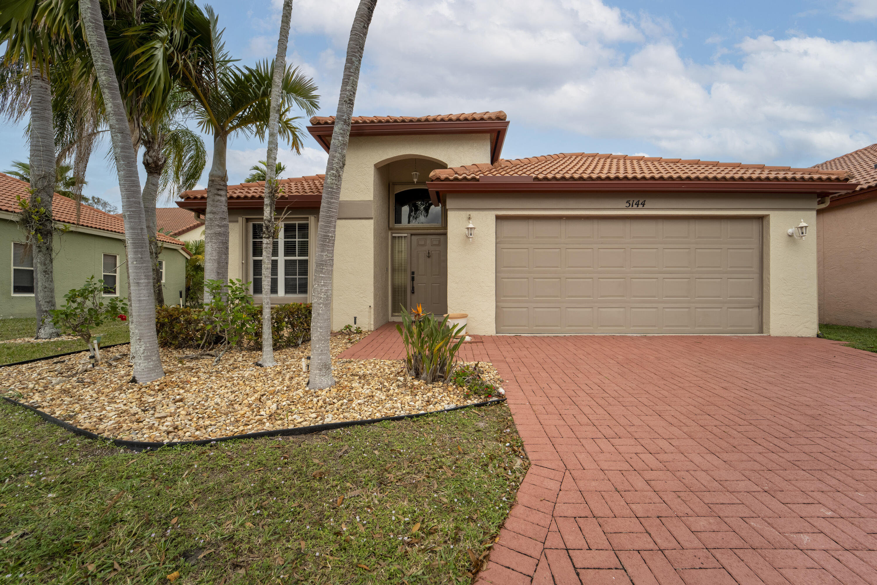 5144 Elpine Way Riviera Beach, FL 33418 - Photo 1 of 39 Front