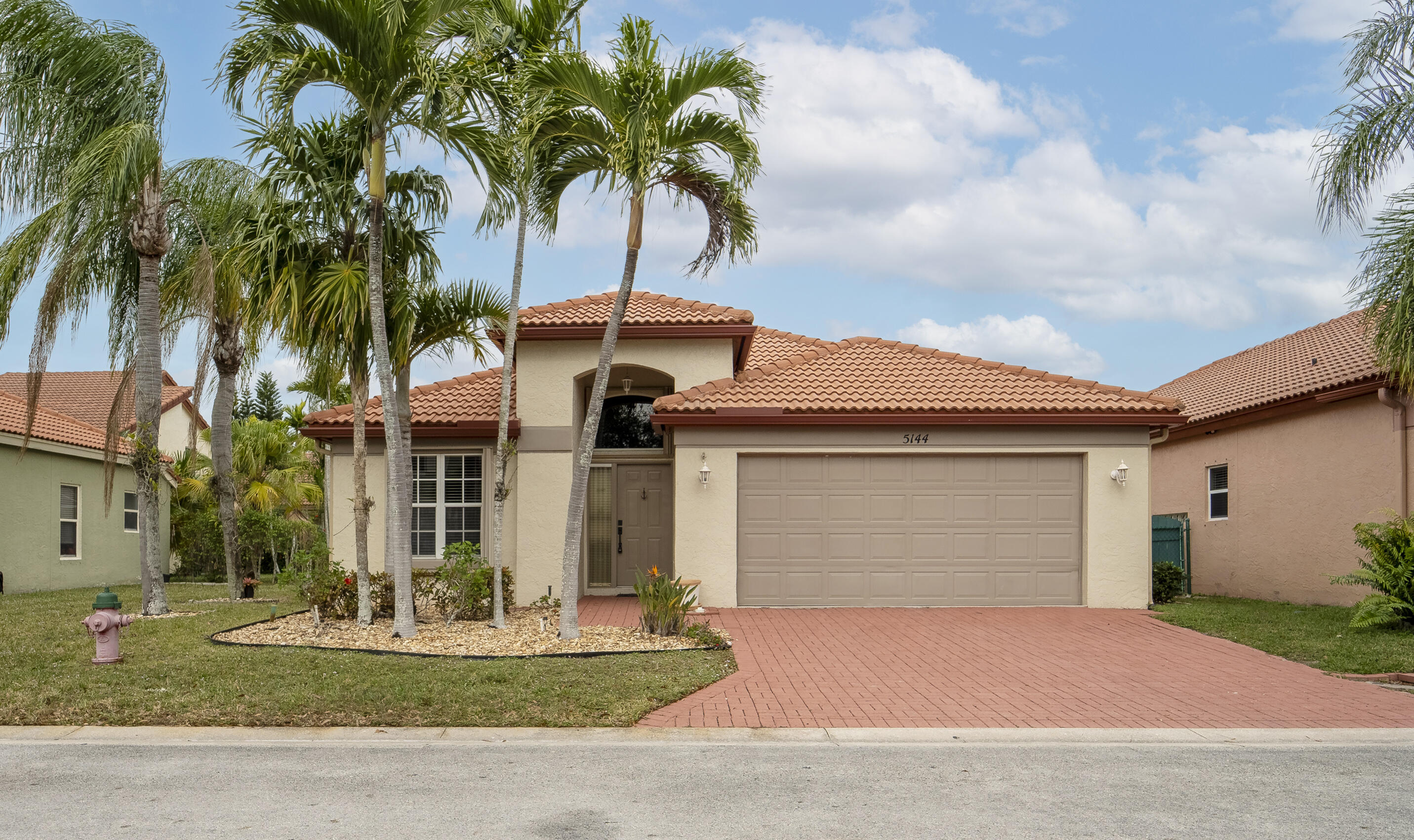 5144 Elpine Way Riviera Beach, FL 33418 - Photo 2 of 39 Front