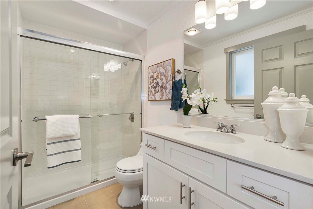 24174 Brier Road Brier, WA 98036 - Photo 16 of 27 a bathroom with a sink a toilet and shower