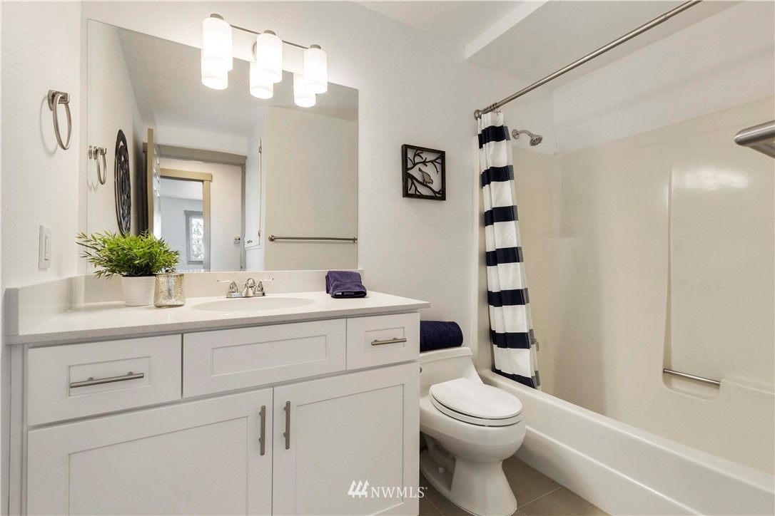 24174 Brier Road Brier, WA 98036 - Photo 19 of 27 a bathroom with a sink a toilet and shower