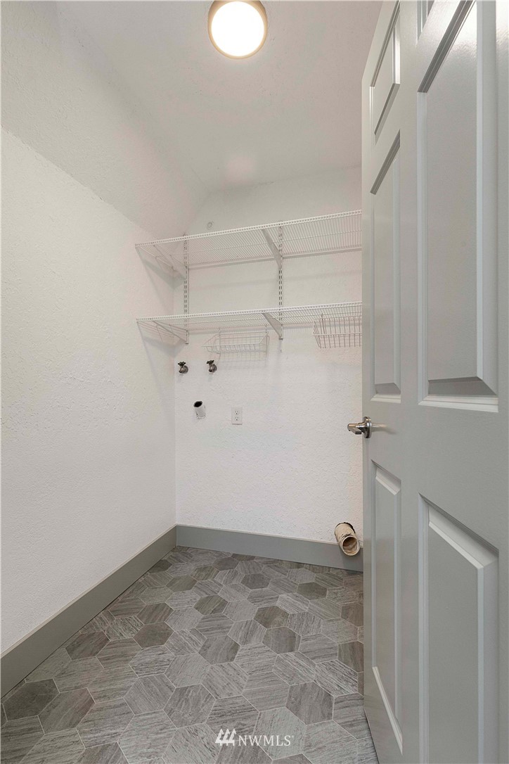 24174 Brier Road Brier, WA 98036 - Photo 23 of 27 a view of storage and utility room with empty racks