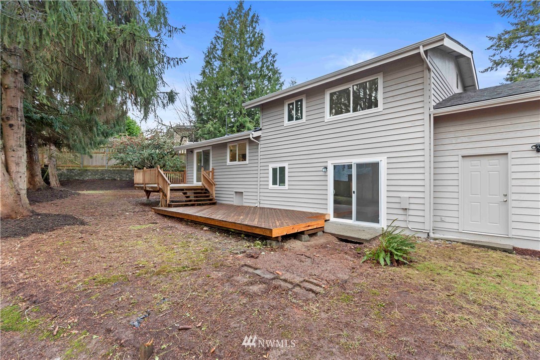 24174 Brier Road Brier, WA 98036 - Photo 25 of 27 a backyard of a house with table and chairs