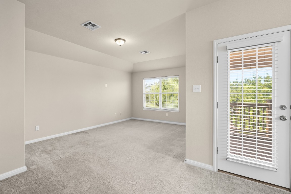 111 Sycamore Street Georgetown, TX 78633 - Photo 11 of 22 an empty room with windows