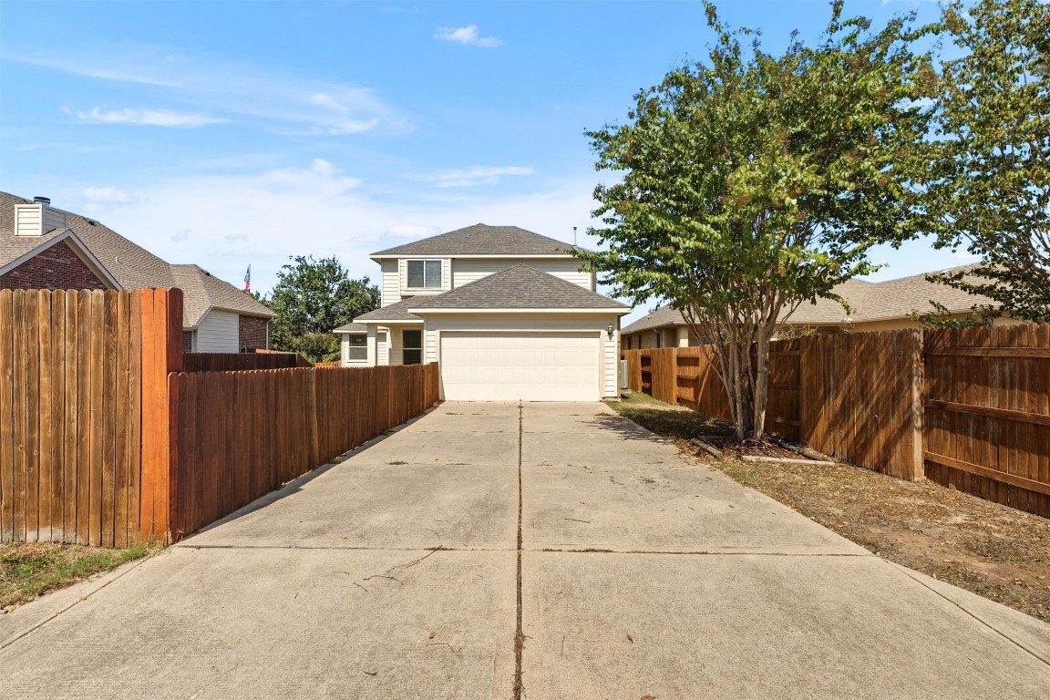111 Sycamore Street Georgetown, TX 78633 - Photo 17 of 22 a front view of a house with a garage