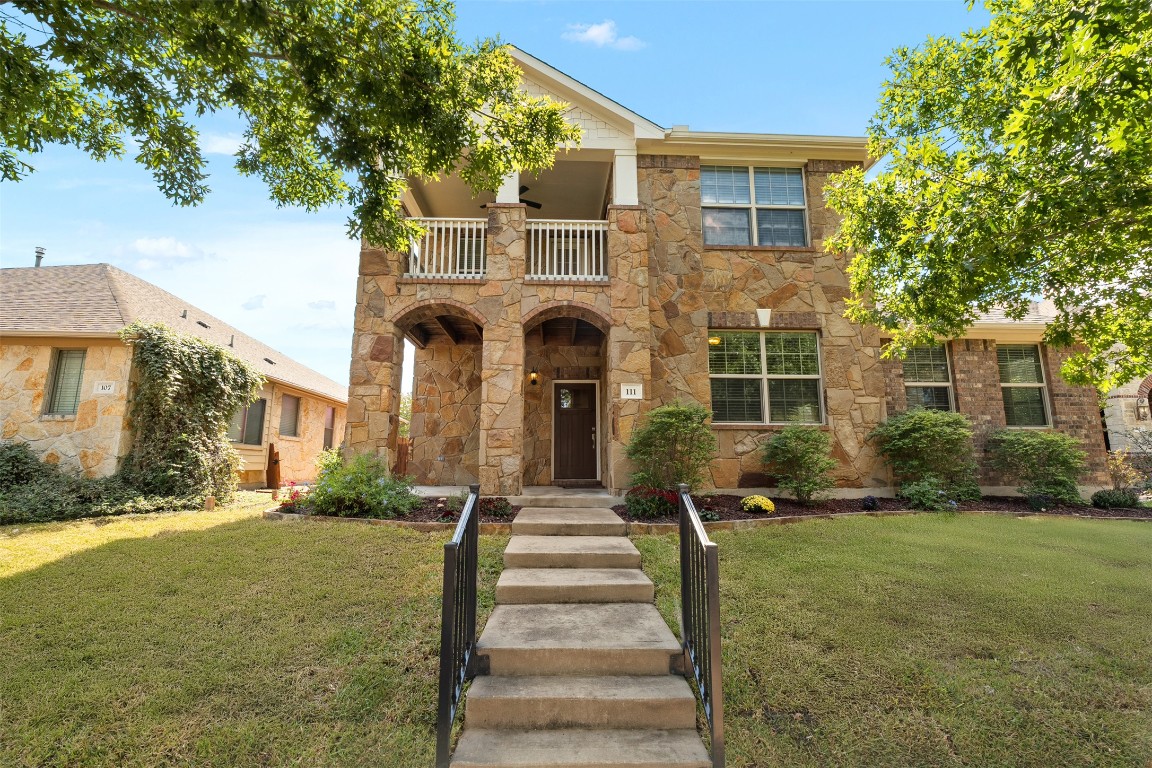111 Sycamore Street Georgetown, TX 78633 - Photo 2 of 22 a front view of a house with a yard