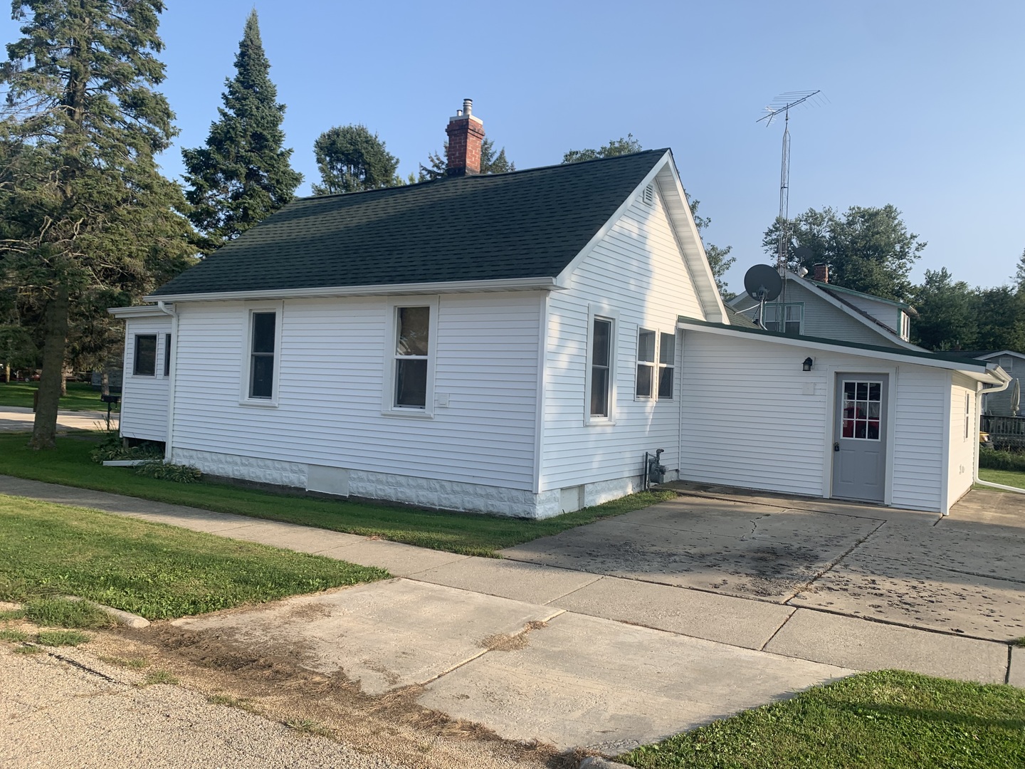 301 South Butler Street Nelson, IL 61021 - Photo 3 of 15 a view of a house with a yard