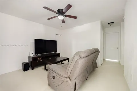 a kitchen with a stove and a refrigerator
