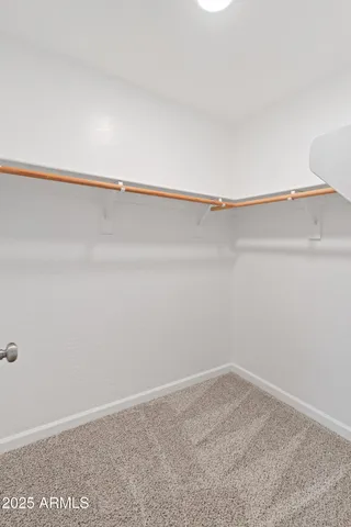 a view of small space with racks on the wall