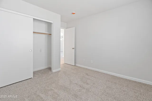 an empty room with closet