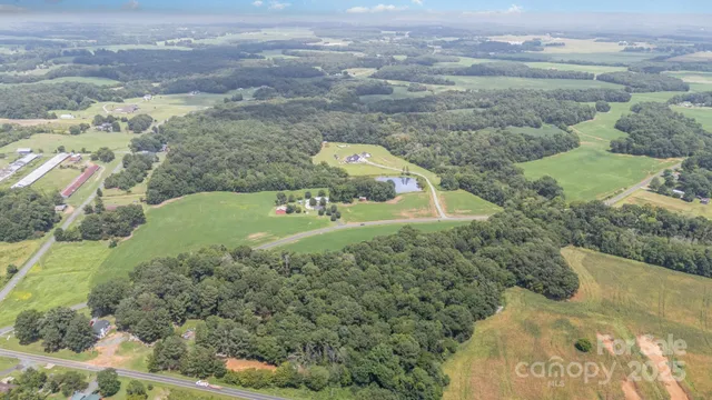a view of a field with an ocean