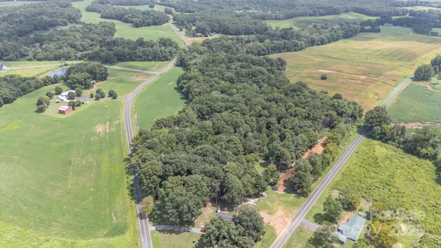 a view of a lake with a building in the background