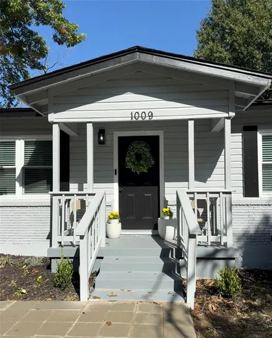 a view of house with outdoor space