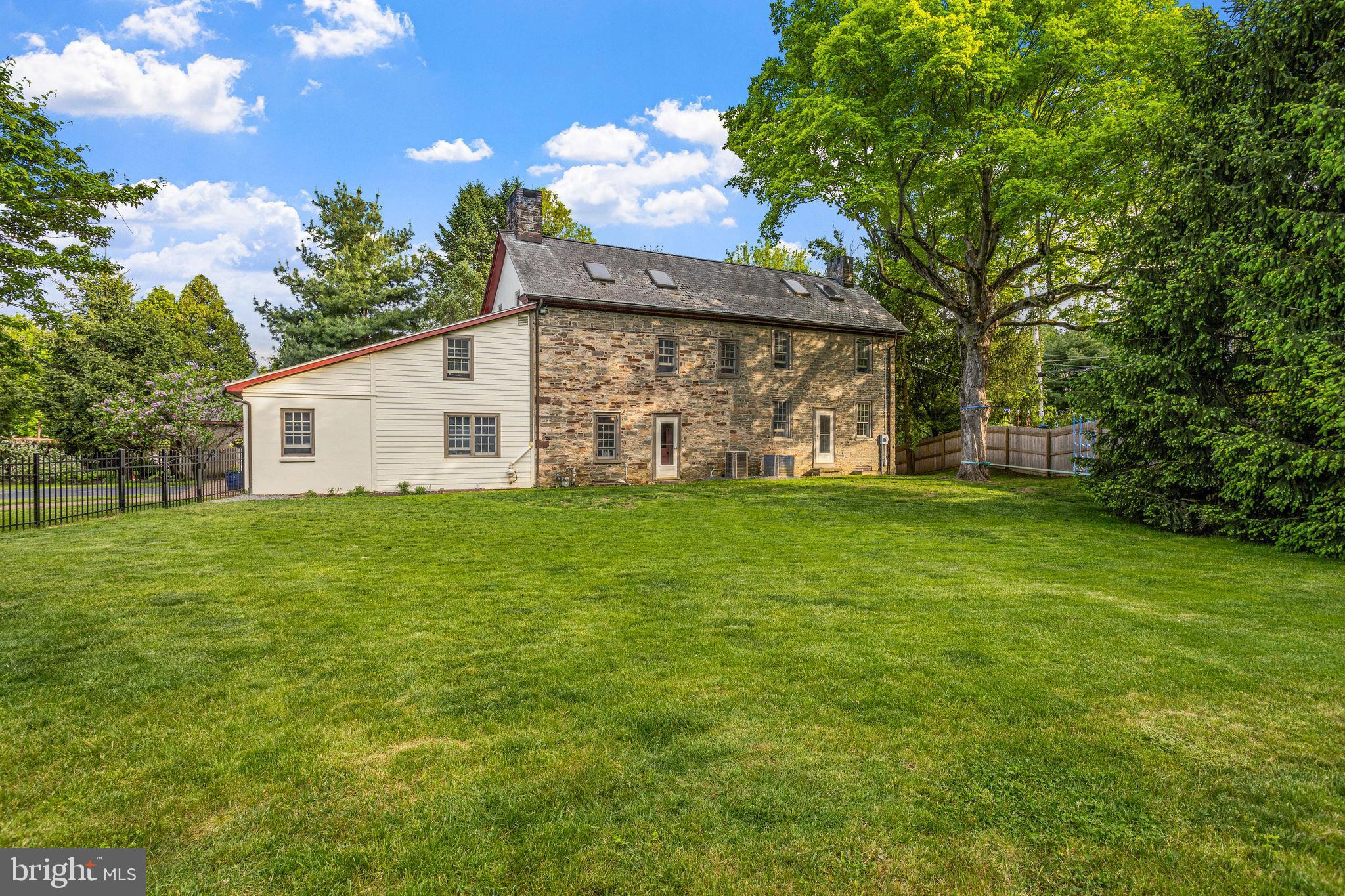 1721 Powderhorn Road Newtown, PA 18940 - Photo 54 of 65 Rear of house and sweeping lawn area