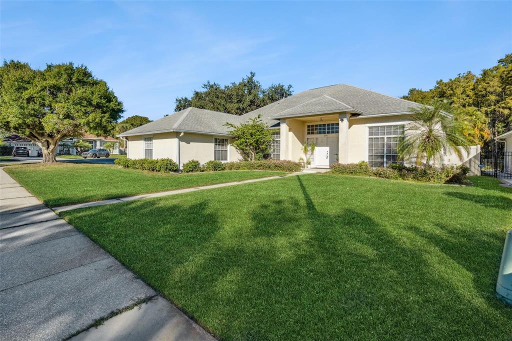 3447 Amaca Circle Orlando, FL 32837 - Photo 2 of 30 a front view of a house with a yard