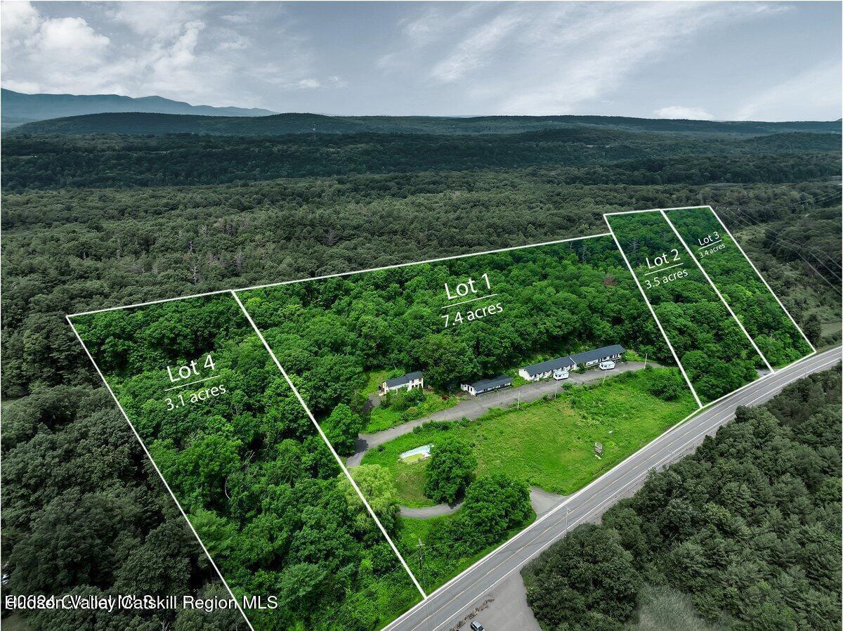 9071 Rte 9W Athens, NY 12015 - Photo 2 of 26 a view of a yard with wooden fence