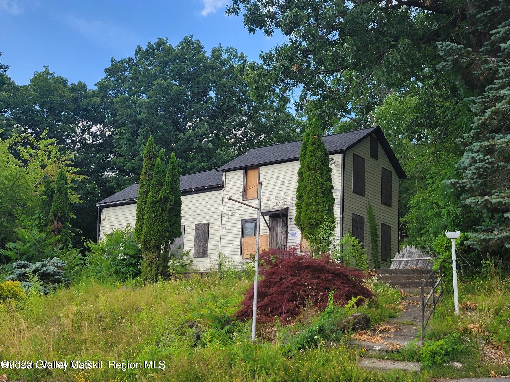 9071 Rte 9W Athens, NY 12015 - Photo 9 of 26 a view of backyard of house with green space