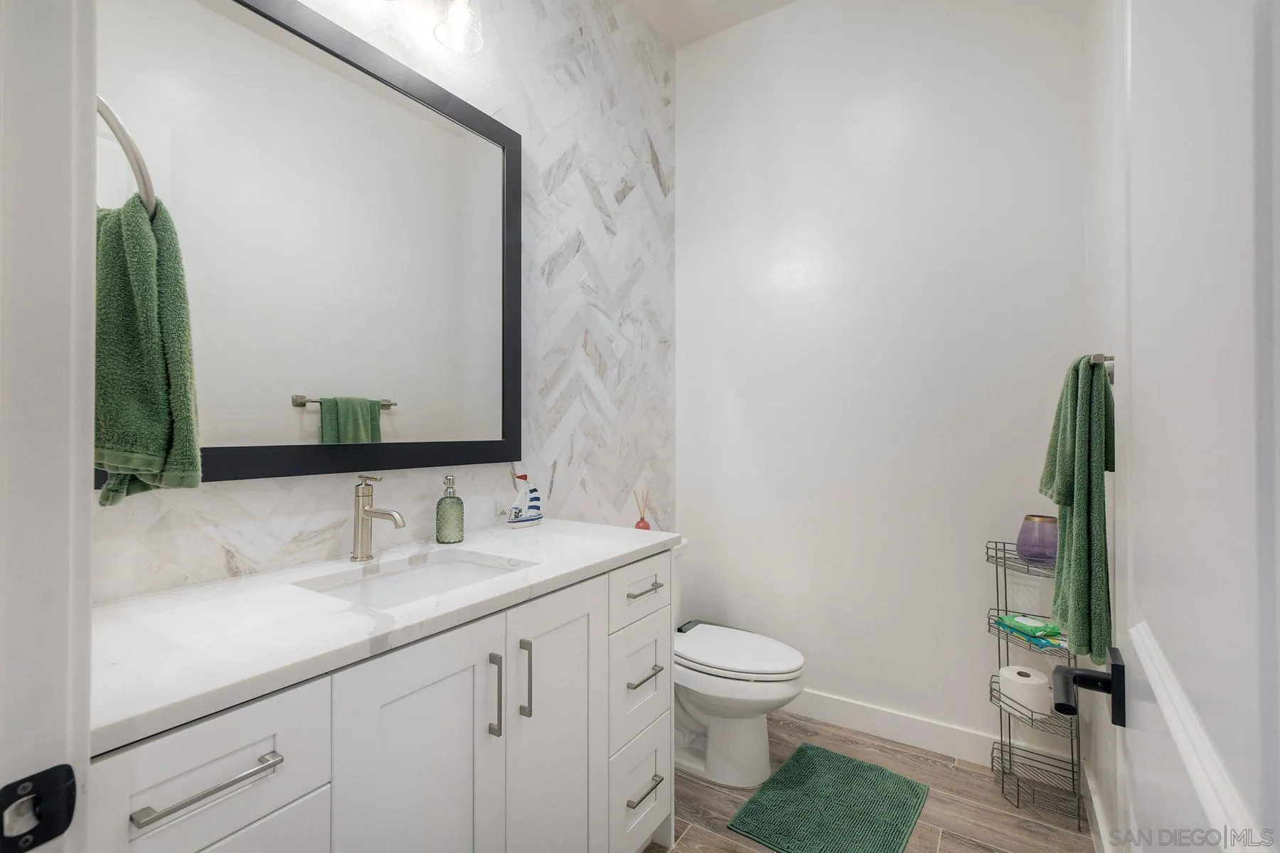 655 Hamilton Lane Escondido, CA 92029 - Photo 26 of 33 Hallway 1/2 Bathroom