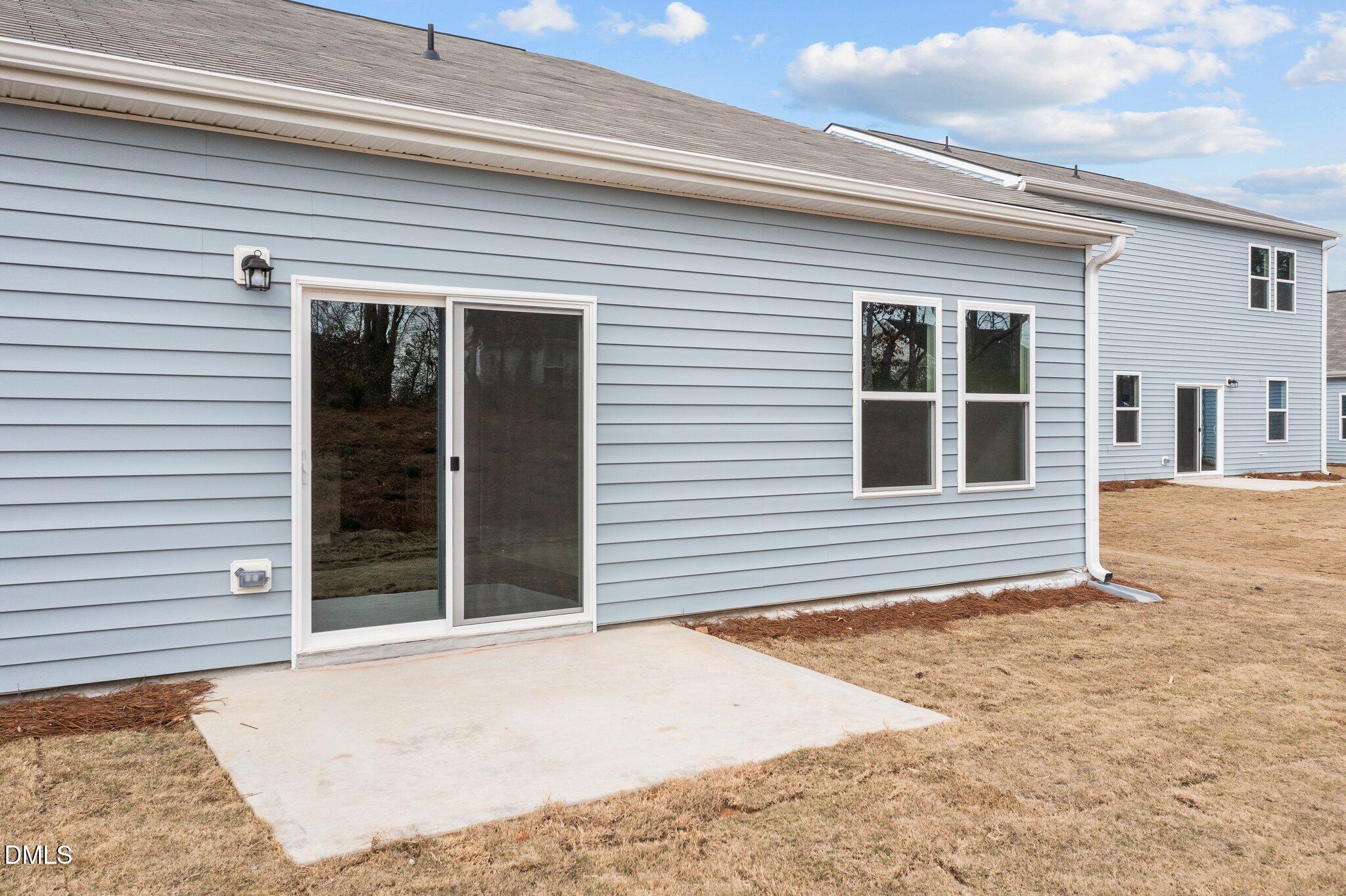 674 Essex Road Nashville, NC 27856 - Photo 20 of 24 a view of a house with a door and a window