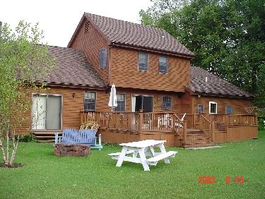 96 East Road Adams, MA 01220 - Photo 1 of 1 a front view of a house with a garden and deck