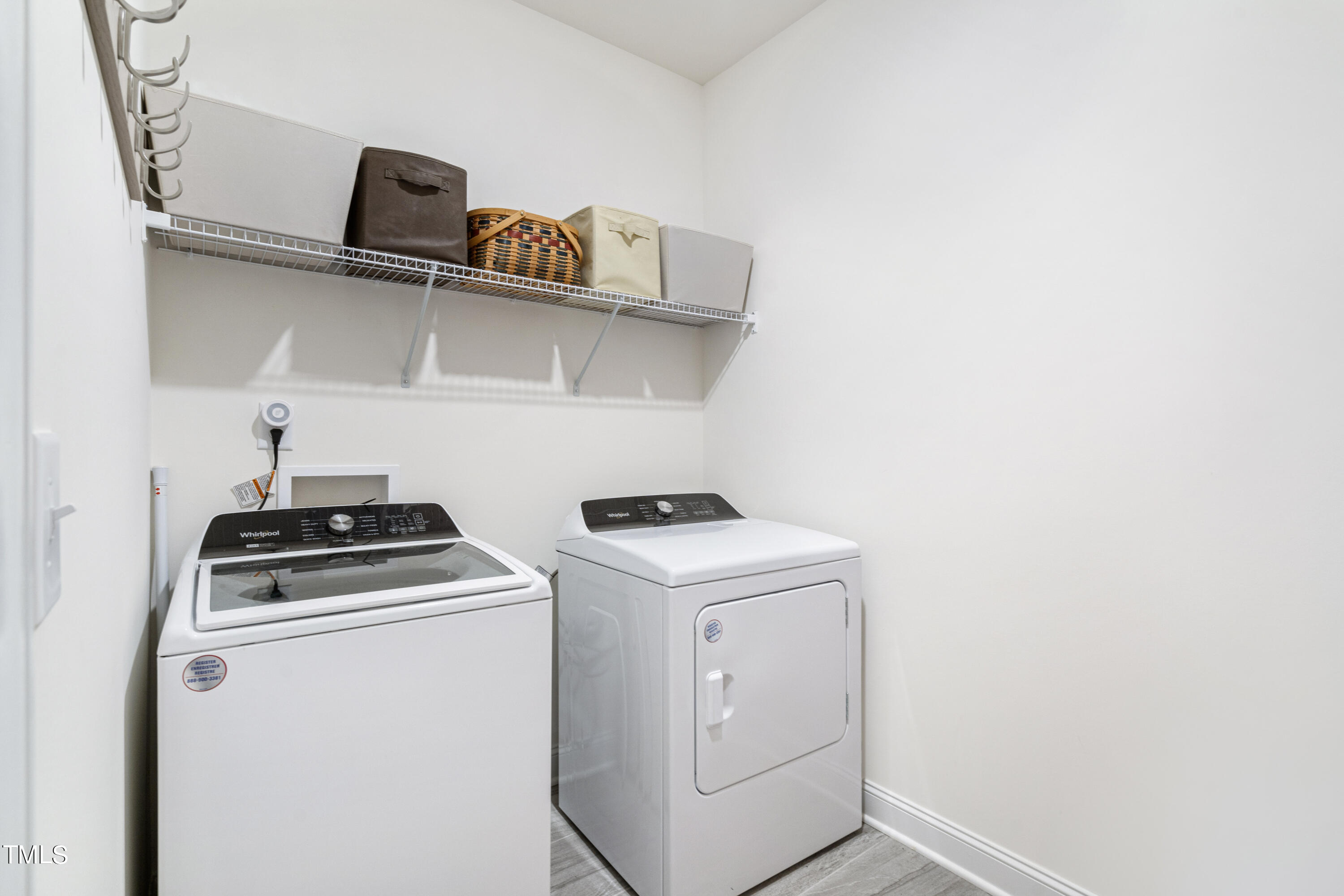 141 Alumroot Road Holly Springs, NC 27540 - Photo 29 of 45 Main Level Laundry