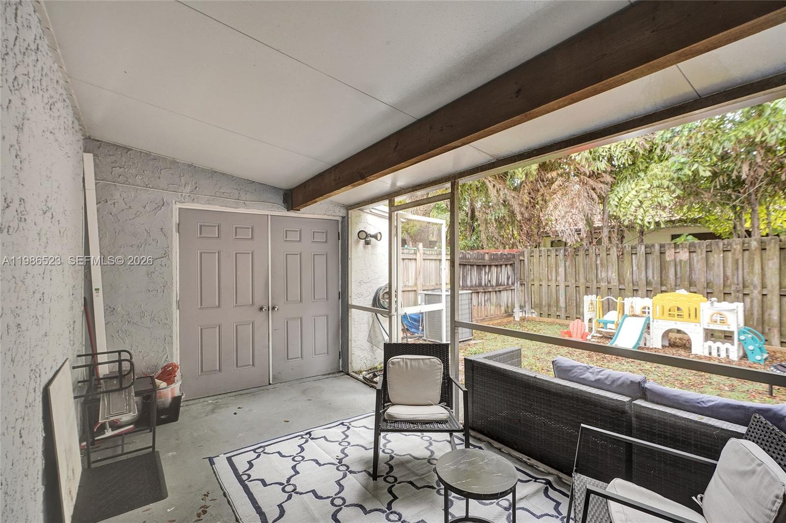 7402 Northwest 75th Street Tamarac, FL 33321 - Photo 23 of 43 Screened Lanai