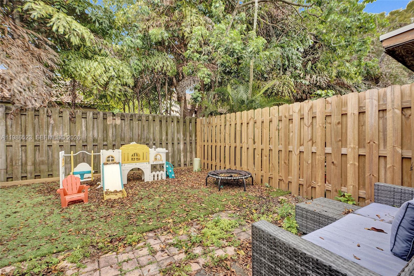 7402 Northwest 75th Street Tamarac, FL 33321 - Photo 25 of 43 Back Yard